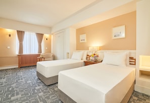 Ropa de cama de alta calidad y minibar 