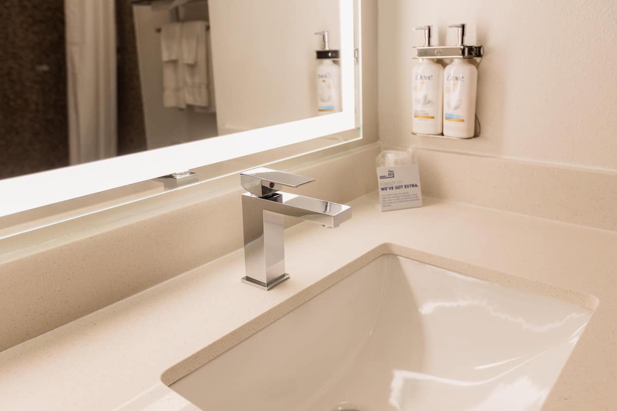 Bathroom | Bathtub, free toiletries, hair dryer, towels
