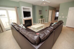 2 Bedroom/2 Bathroom Premium Condo | Living room | TV, fireplace, DVD player - Hamilton Cay at Bermuda Bay by Kees Vacations (Kill Devil Hills)