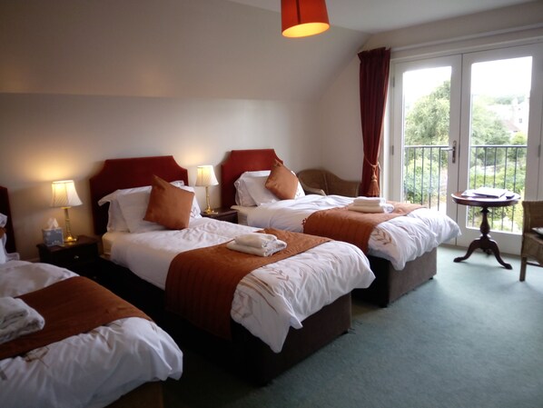 Superior-Dreibettzimmer | Hochwertige Bettwaren, individuell dekoriert, individuell eingerichtet