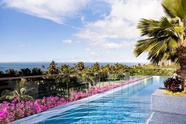 Outdoor pool, open 6:00 AM to 10:00 PM, sun loungers