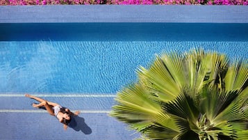 Outdoor pool, open 6:00 AM to 10:00 PM, sun loungers