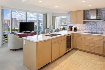 Deluxe Suite, 2 Bedrooms, Ocean View (Newly Renovated) | Private kitchen | Coffee/tea maker, fridge, microwave, stovetop at Ka Laʻi Waikiki Beach, LXR Hotels & Resorts