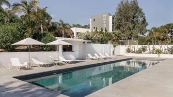 Outdoor pool, open 8:00 AM to 11:00 PM, pool umbrellas, pool loungers