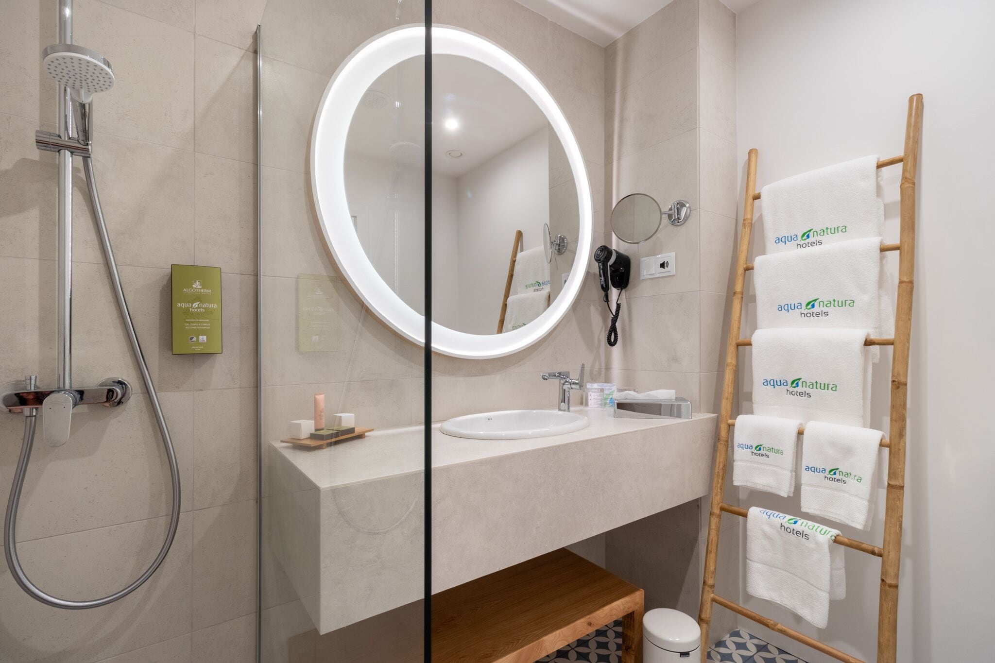 hair dryer, bathrobes, slippers, towels