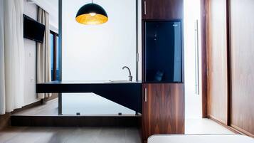 Junior Suite, Jetted Tub, Sea View | Living area | LCD TV