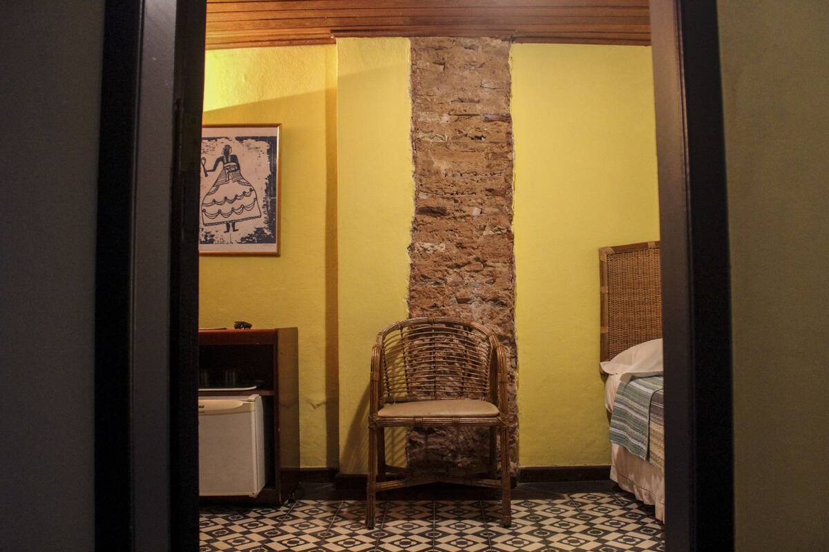 Economy Double Room | Minibar, in-room safe, desk, iron/ironing board (on request)
