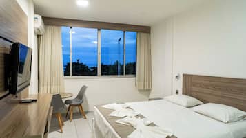Double or Twin Room, Sea View | Minibar, in-room safe, free WiFi, bed sheets