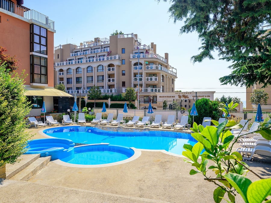 Seasonal outdoor pool, pool umbrellas, pool loungers