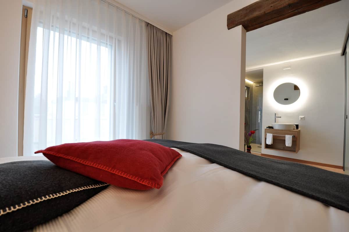Premium bedding, down duvets, in-room safe, blackout curtains
