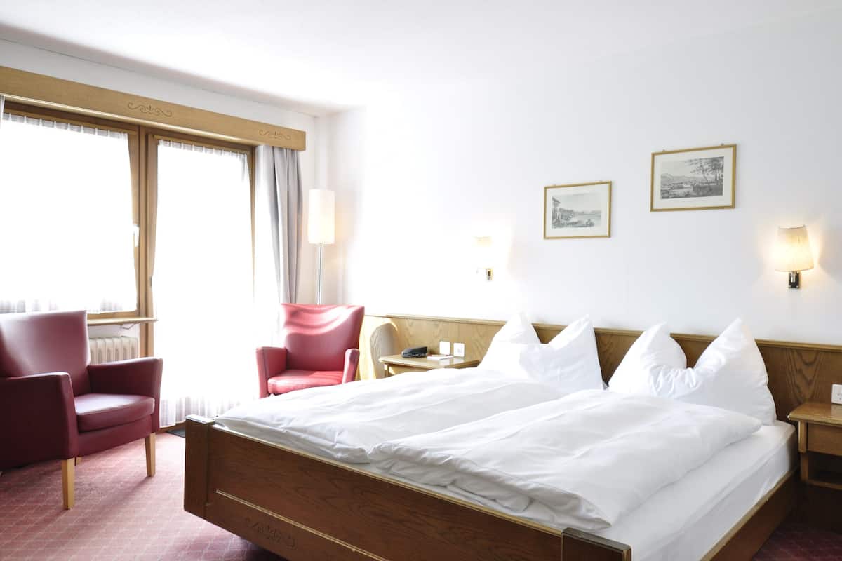 Premium bedding, down duvets, in-room safe, blackout curtains
