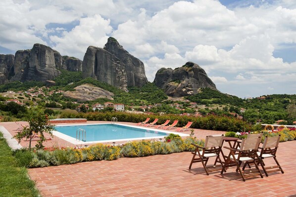 Outdoor pool, pool umbrellas, pool loungers