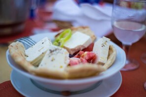 Breakfast, dinner served; Mediterranean cuisine, pool views 