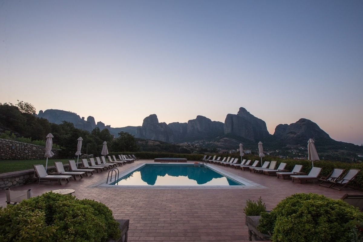 outdoor pool, pool umbrellas, pool loungers