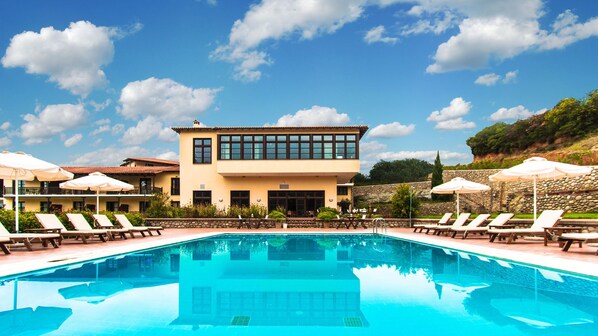 Outdoor pool, pool umbrellas, pool loungers