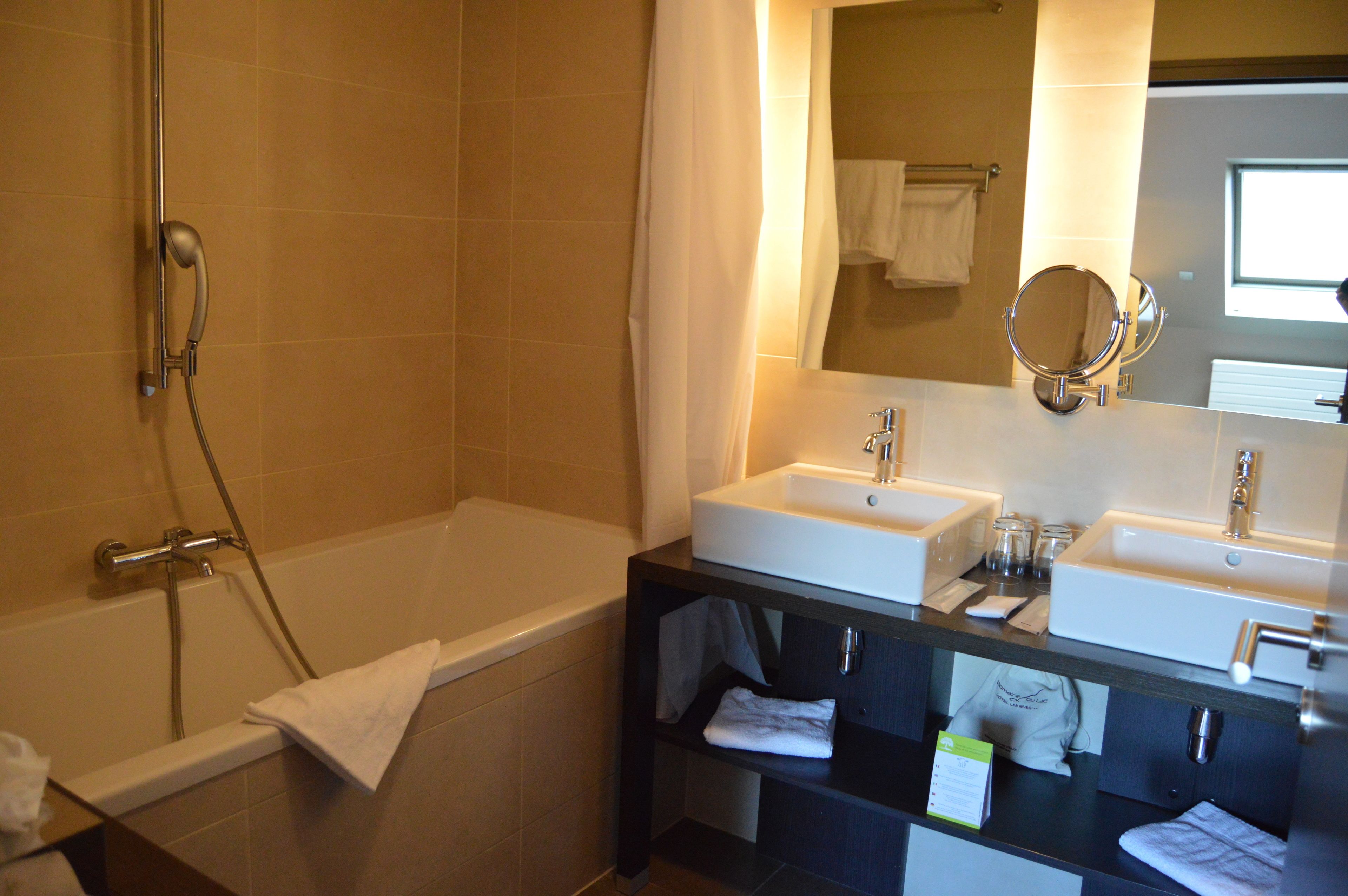suite, lake view | bathroom | free toiletries, hair dryer, towels