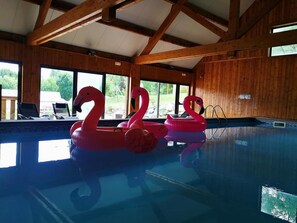 Indoor pool, open 9 AM to 8 PM, pool loungers
