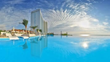 Indoor pool, seasonal outdoor pool, open 8 AM to 4:00 PM, pool umbrellas