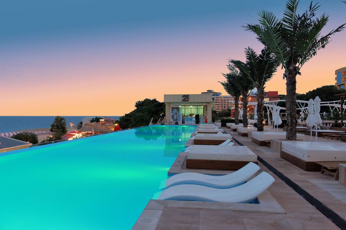 indoor pool, seasonal outdoor pool, open 8 am to 4:00 pm, pool umbrellas