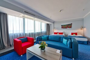 En 32-tommers Flatskjerm-TV med kabel-kanaler samt TV