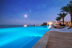 Indoor pool, seasonal outdoor pool, open 8 AM to 4:00 PM, pool umbrellas