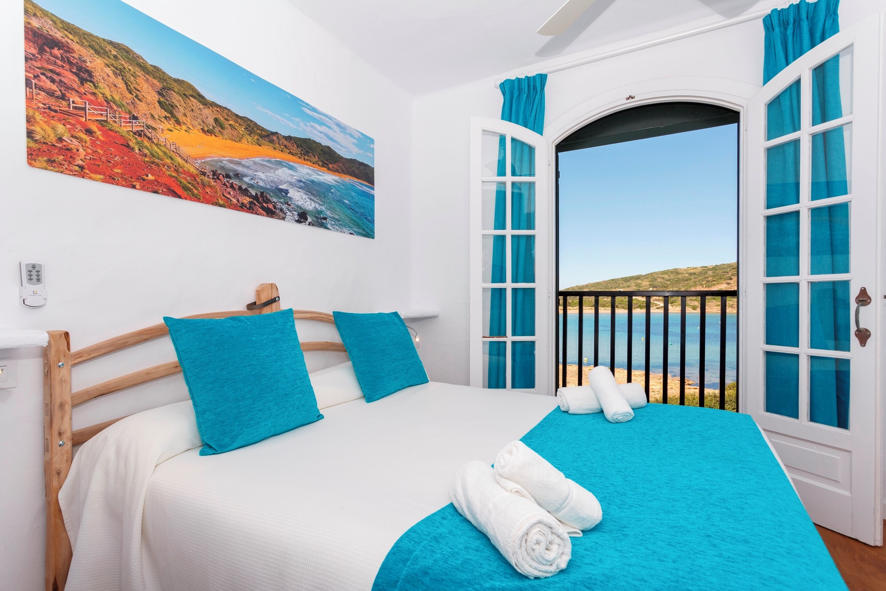Apartment, 2 Bedrooms, Partial Sea View | Blackout drapes, free cribs/infant beds, free WiFi, bed sheets