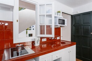 Apartment, 2 Bedrooms | Private kitchen | Fridge, microwave, coffee/tea maker, electric kettle