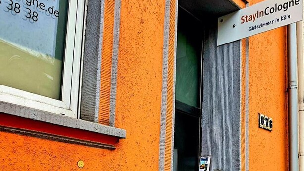 A building with a sign reading "StayInCologne" indicating a guesthouse in Cologne. - StayInCologne (Cologne)