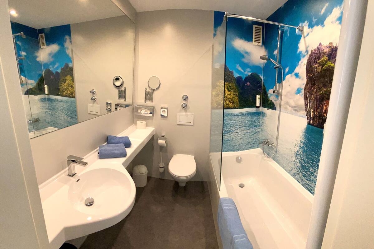 eco-friendly toiletries, hair dryer, towels