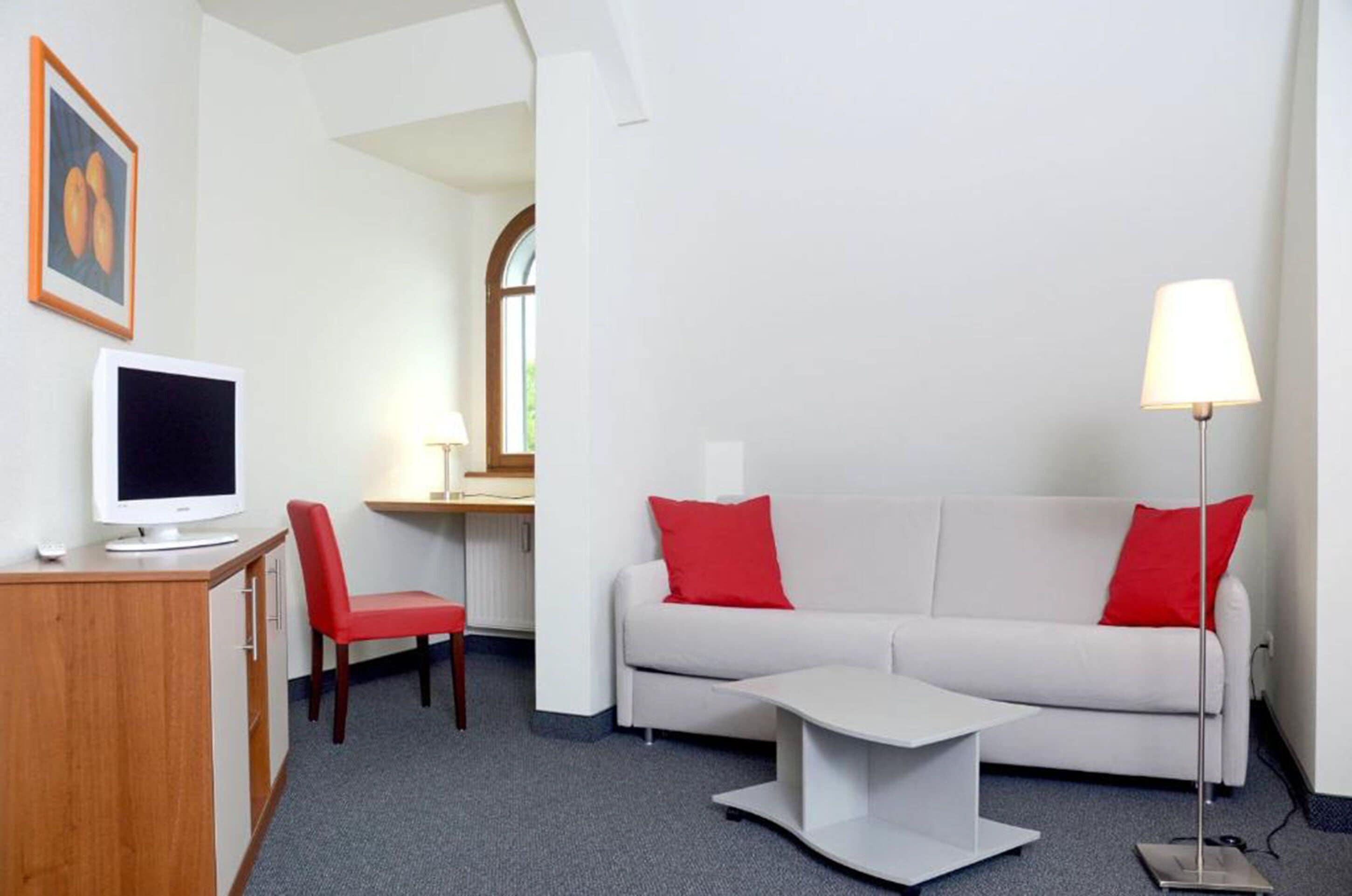 standard apartment | living area | flat-screen tv