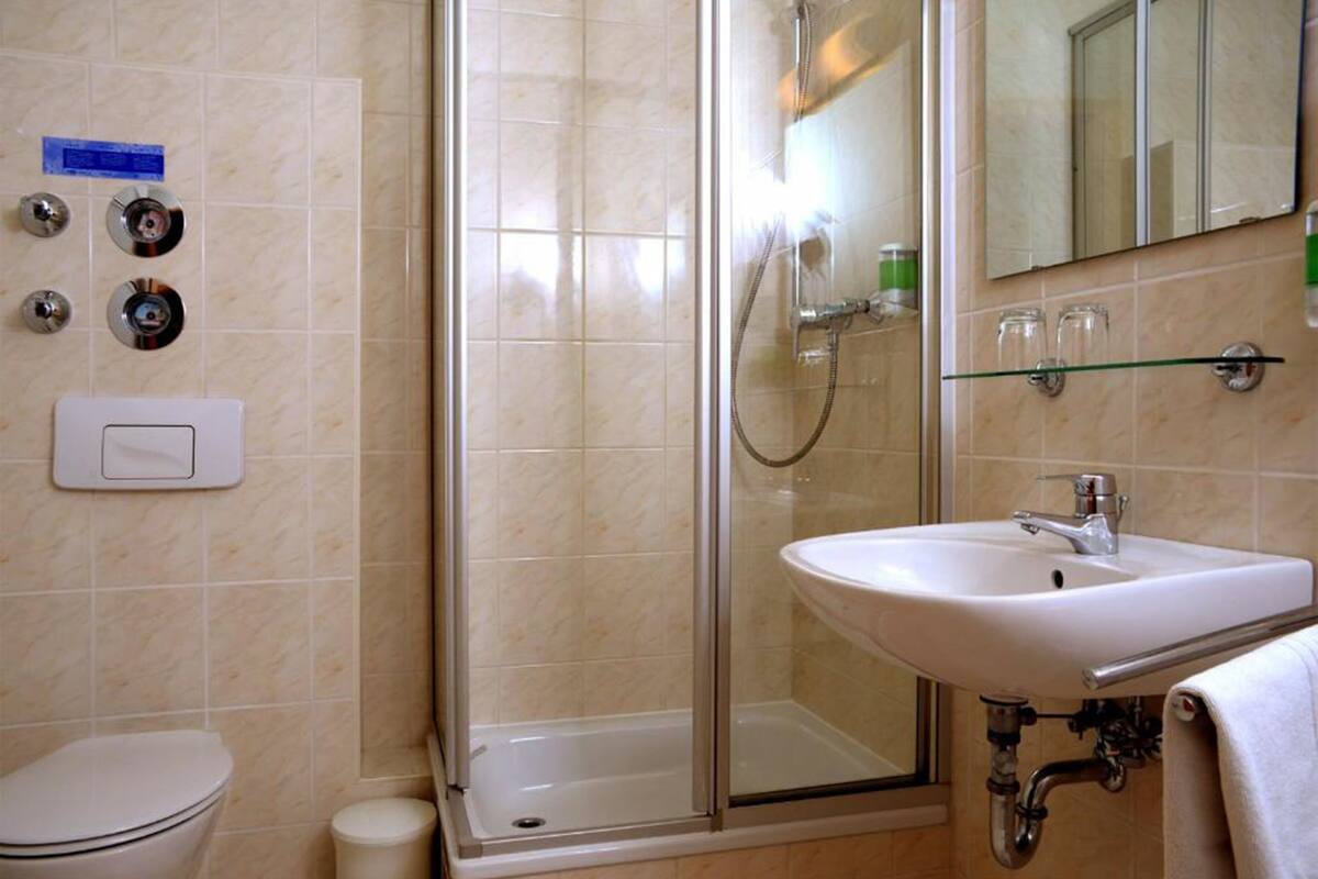 standard apartment | bathroom | hair dryer, towels