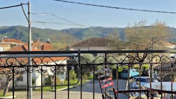 Triple Room, City View | Blackout drapes, iron/ironing board, free WiFi, bed sheets
