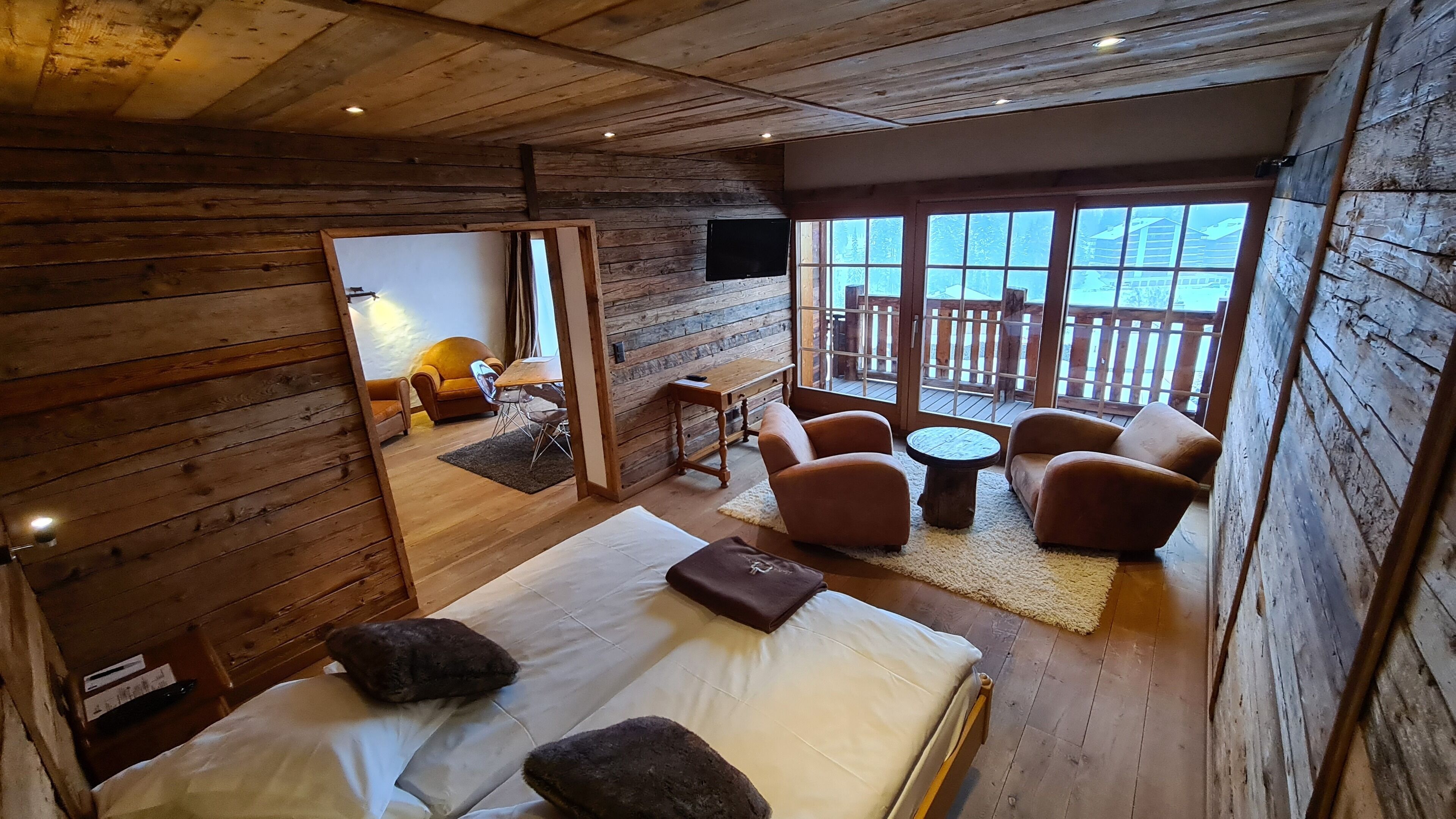 suite, balcony, mountain view (south) | living area | lcd tv