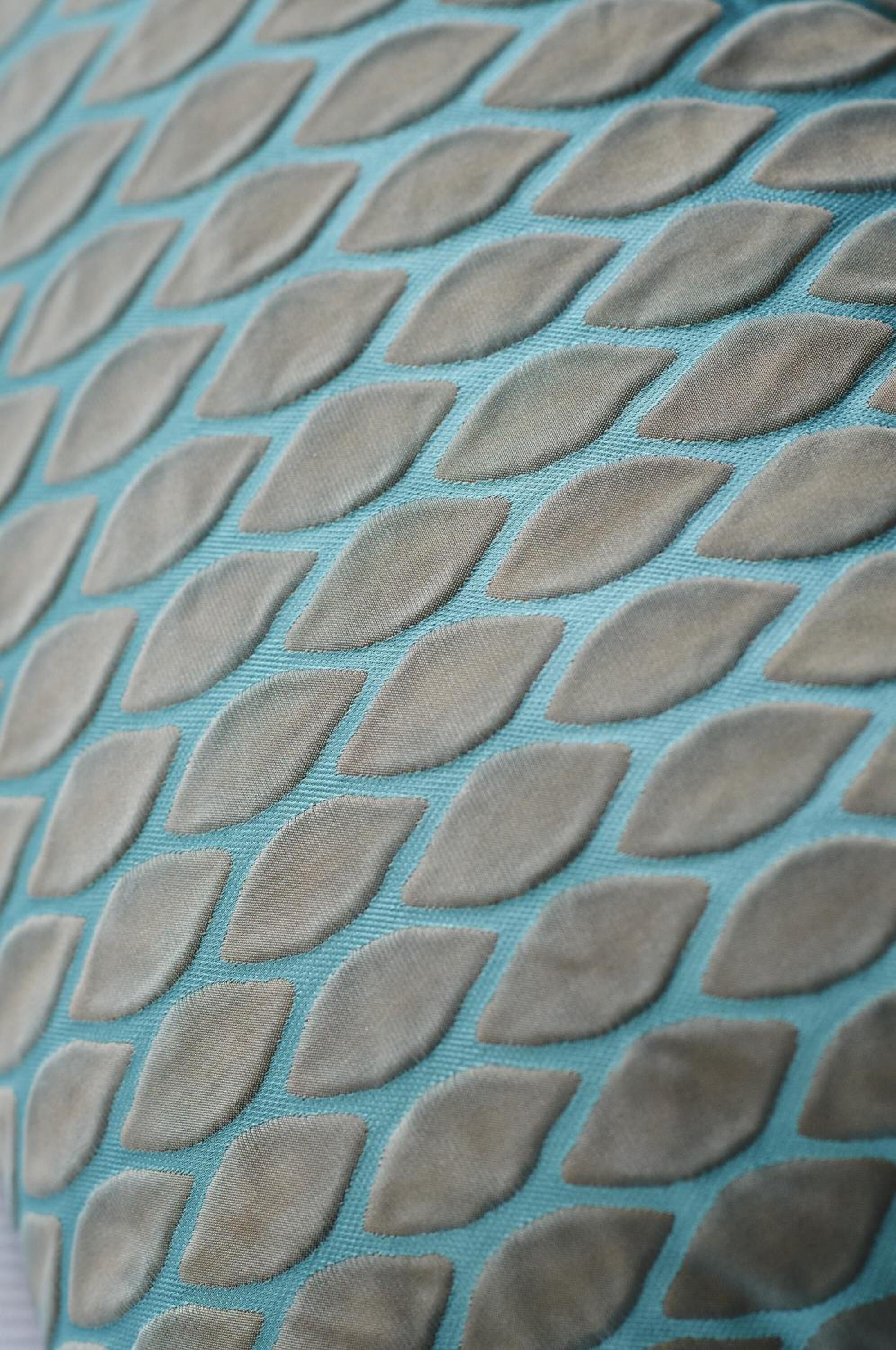 A close-up of a fabric with a geometric pattern.