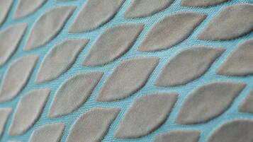 A close-up of a fabric with a geometric pattern.