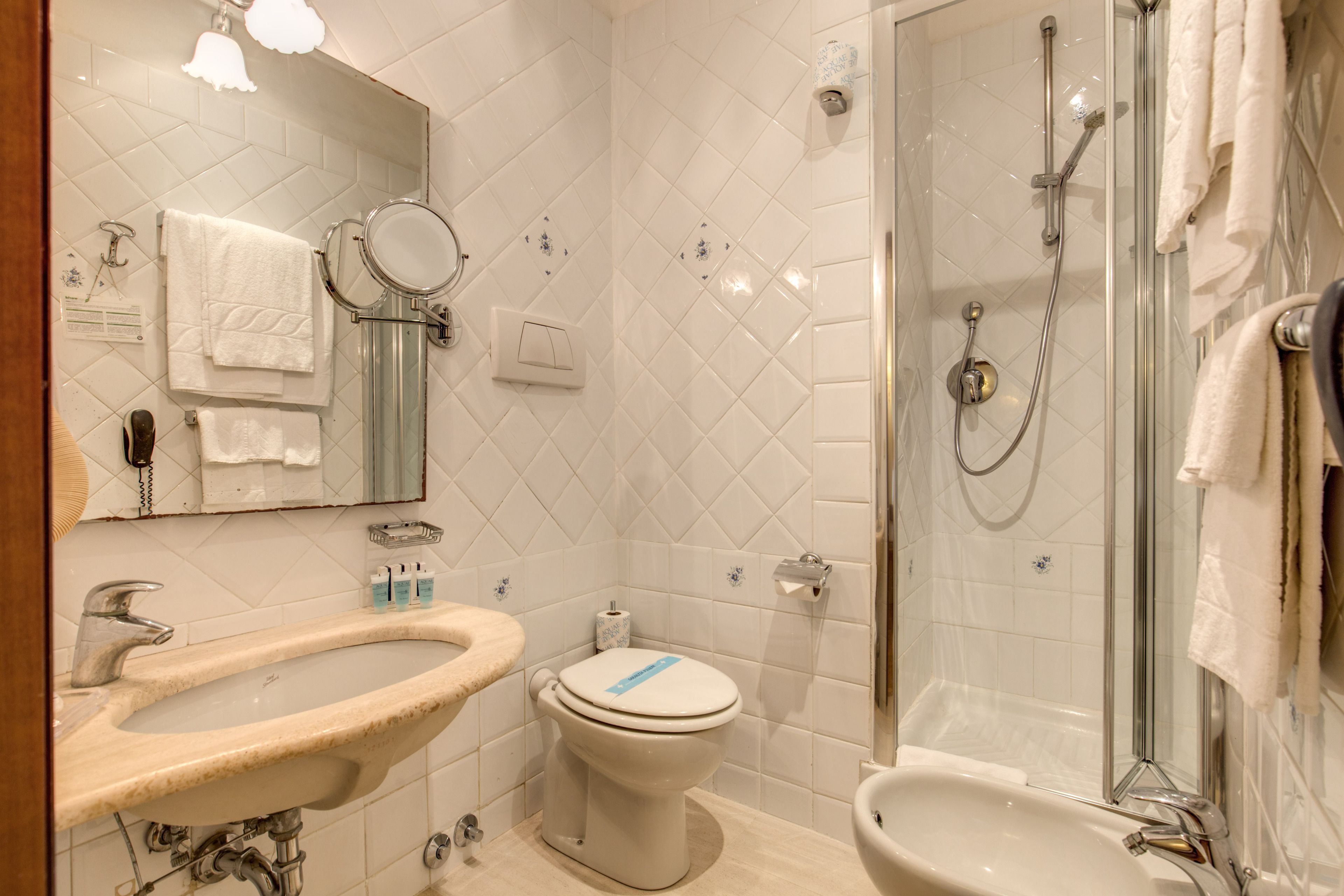 bathtub, free toiletries, hair dryer, towels