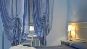 Double Room | Pillow-top beds, individually furnished, desk, bed sheets