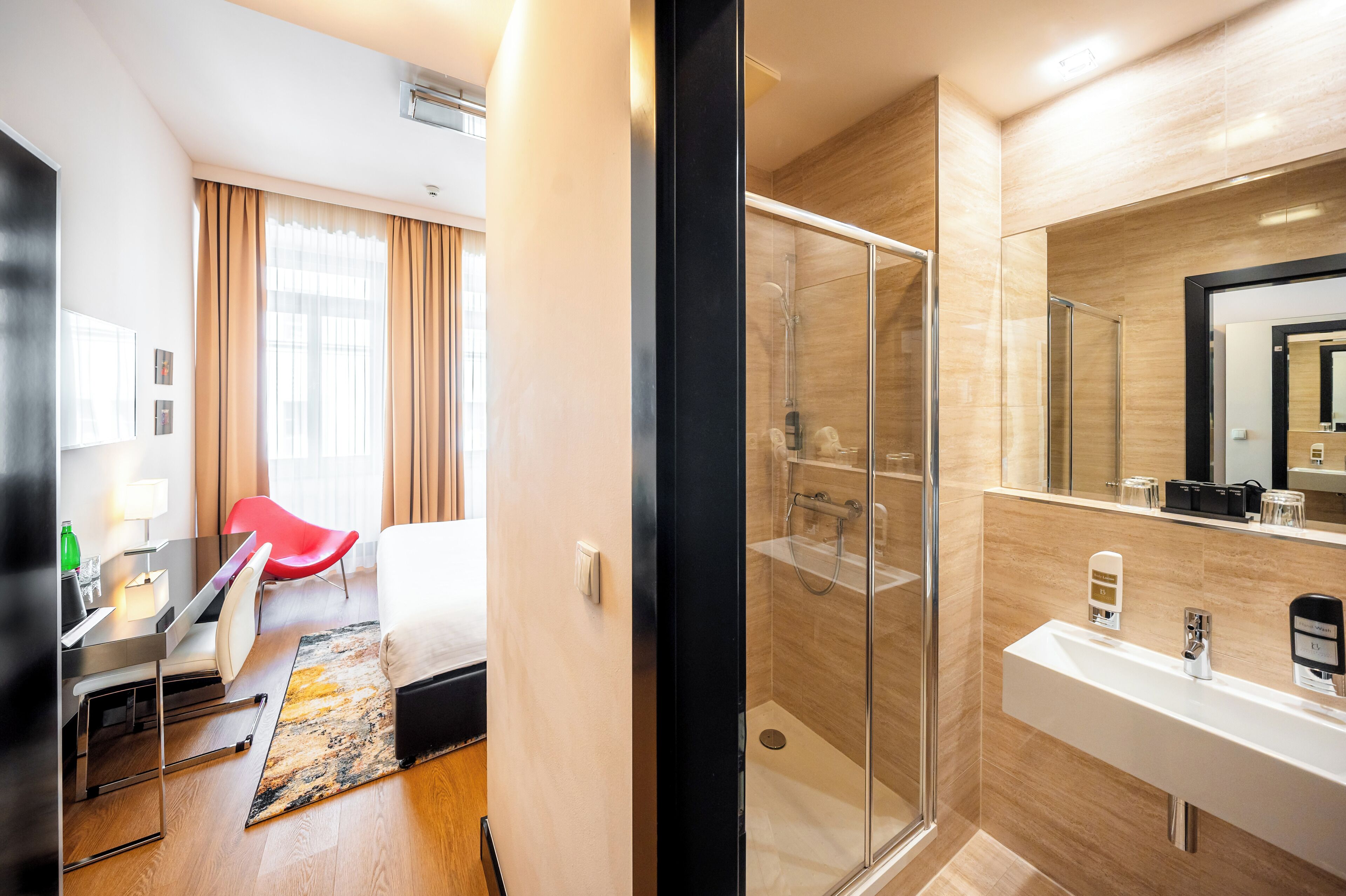 superior double or twin room | bathroom | combined shower/bathtub, eco-friendly toiletries, hair dryer, towels