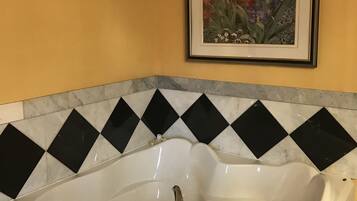 Suite, 1 King Bed, Jetted Tub | Private spa tub