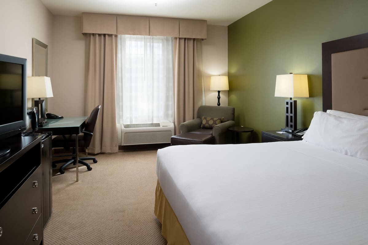 1 bedroom, hypo-allergenic bedding, pillowtop beds, blackout drapes
