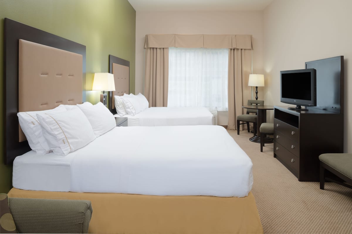 1 bedroom, hypo-allergenic bedding, pillowtop beds, blackout drapes