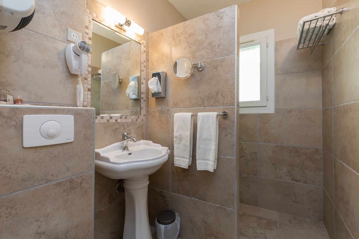 superior room | bathroom | free toiletries, hair dryer, towels, soap