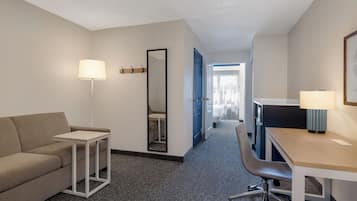 Room, 1 King Bed with Sofa bed | Living area | 32-inch flat-screen TV with cable channels, TV