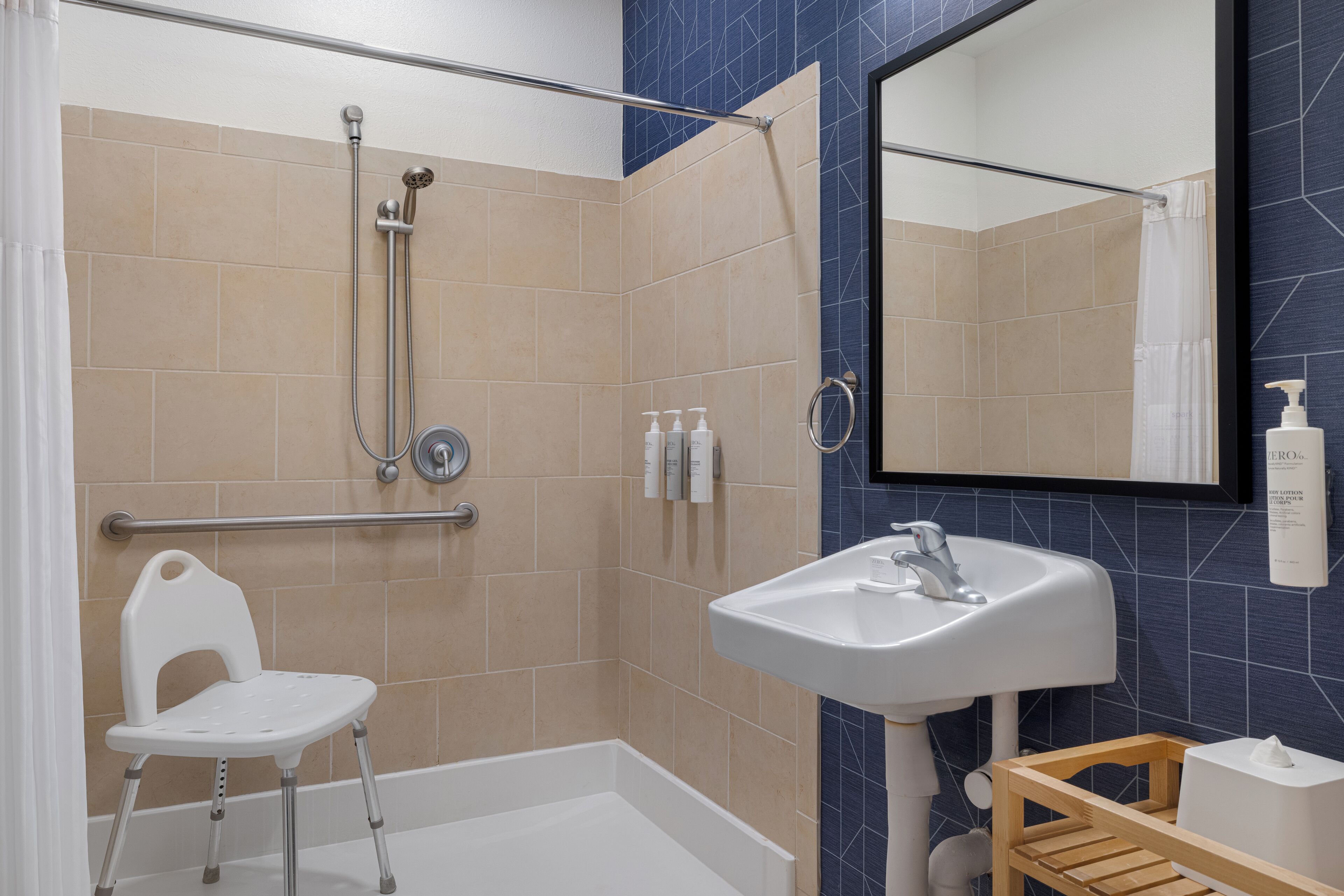 Room, 1 King Bed, Accessible (Mobility & Hearing, Roll-in Shower) | Bathroom | Combined shower/tub, free toiletries, hair dryer, towels