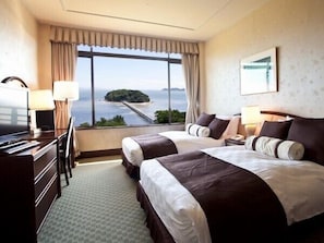 Suite (Sea-Side) | In-room safe, desk, iron/ironing board, free WiFi