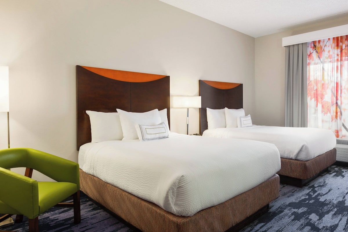 Premium bedding, down comforters, pillowtop beds, desk