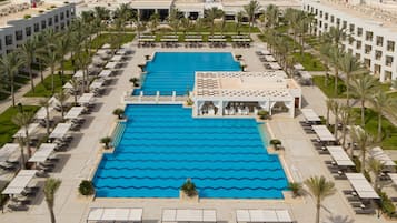 2 outdoor pools, pool umbrellas, pool loungers