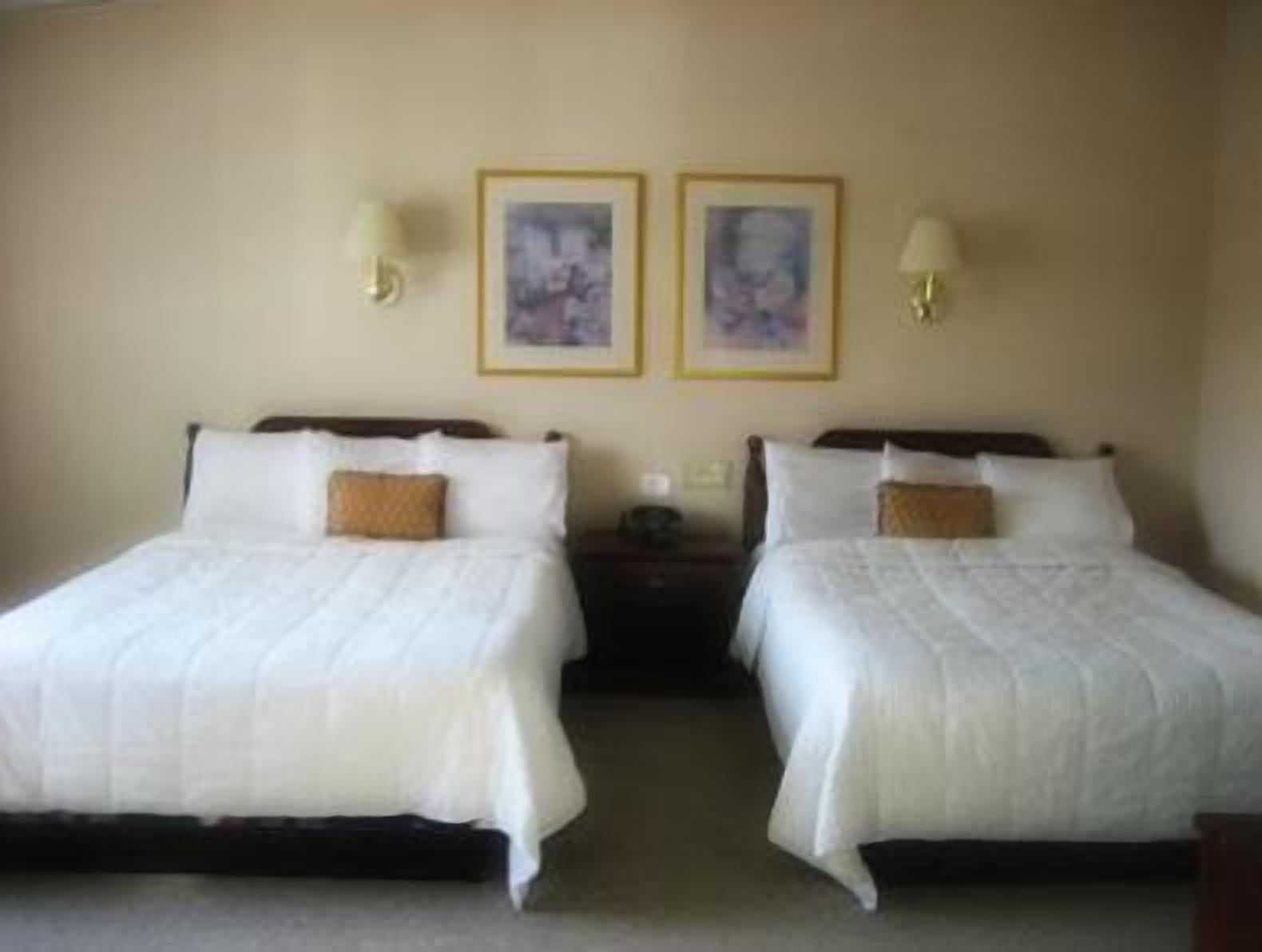 Standard Room, 2 Queen Beds, Non Smoking | Iron/ironing board, free WiFi, bed sheets, alarm clocks