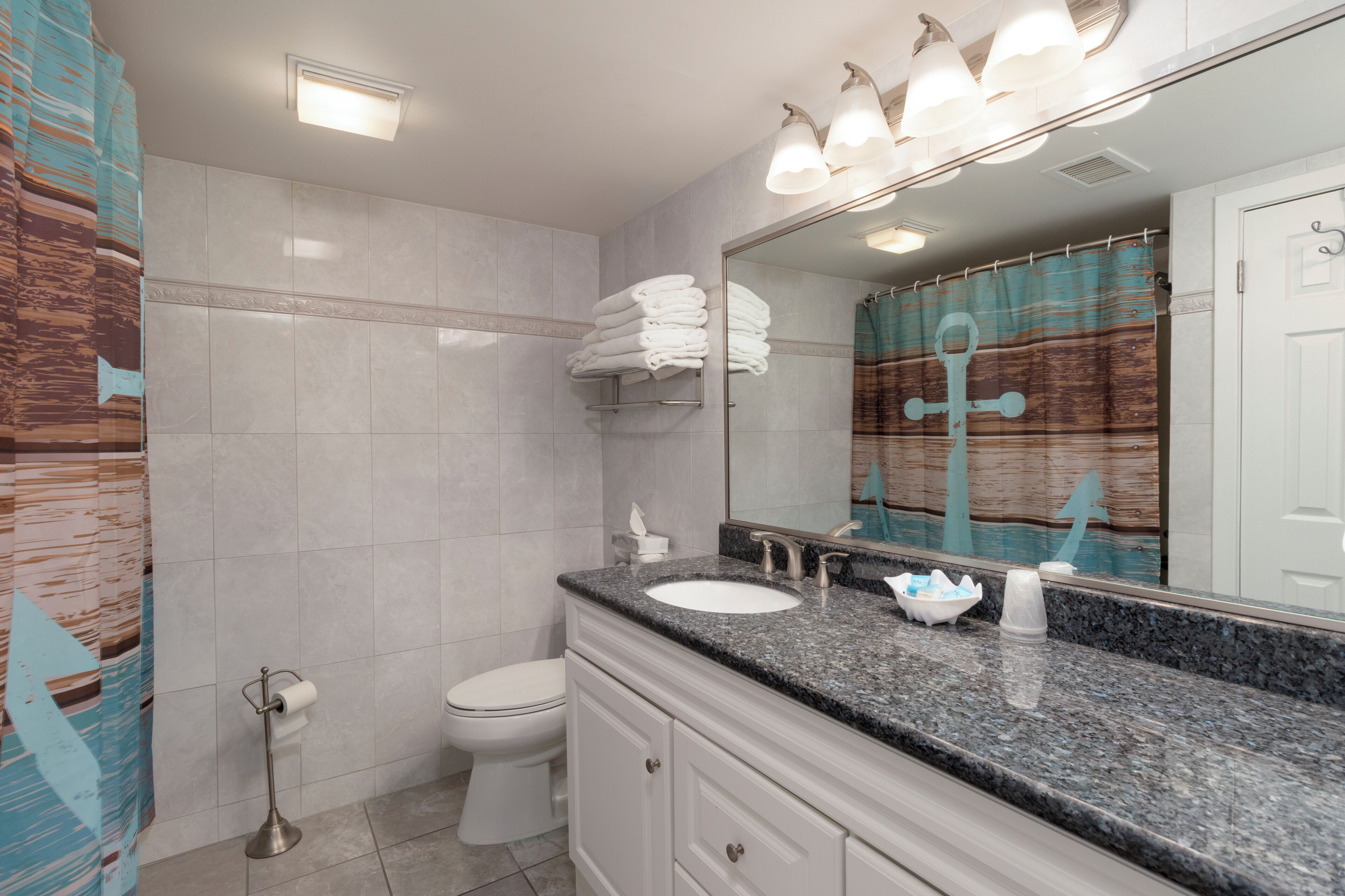 superior suite, 1 queen bed with sofa bed, balcony (top floor) | bathroom | combined shower/bathtub, free toiletries, hair dryer, towels