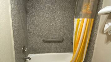 Bathtub, free toiletries, hair dryer, towels